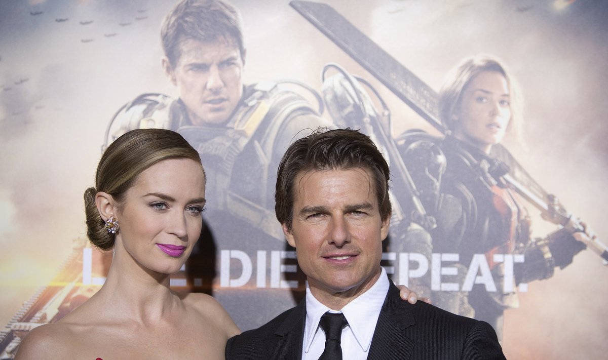 Cast members Emily Blunt and Tom Cruise arrive for the premiere of "Edge of Tomorrow" in New York
