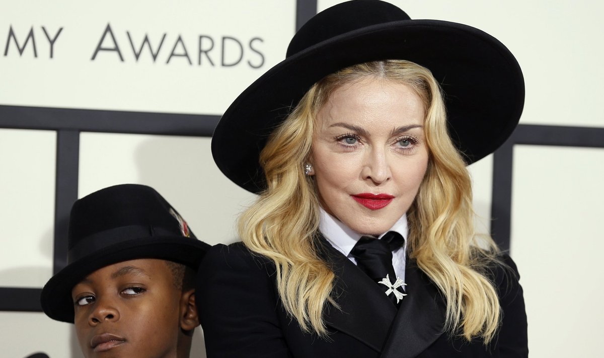 Madonna and her son, David Ritchie, arrive at the 56th annual Grammy Awards in Los Angeles