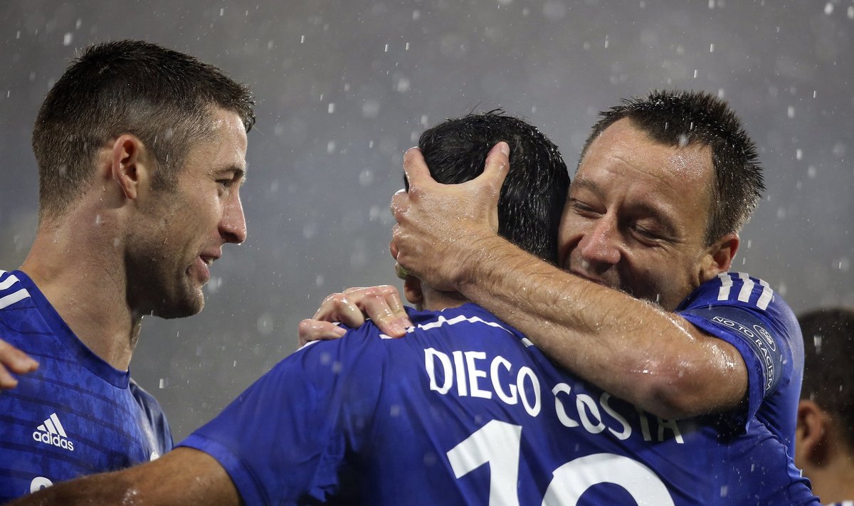 Chelsea's Costa is congratulated by Cahill and Terry after scoring his first goal against Real Sociedad during their friendly soccer match at Stamford Bridge in London