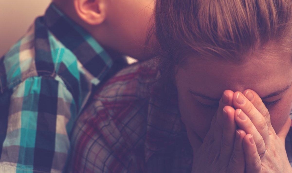 Crying,Unhappy,Mother,With,Child,At,Home