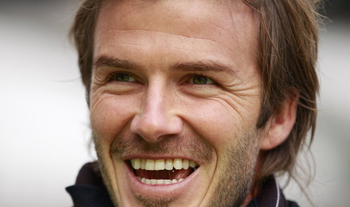 British soccer player David Beckham speaks to the media during a visit to the main Olympic stadium, in London