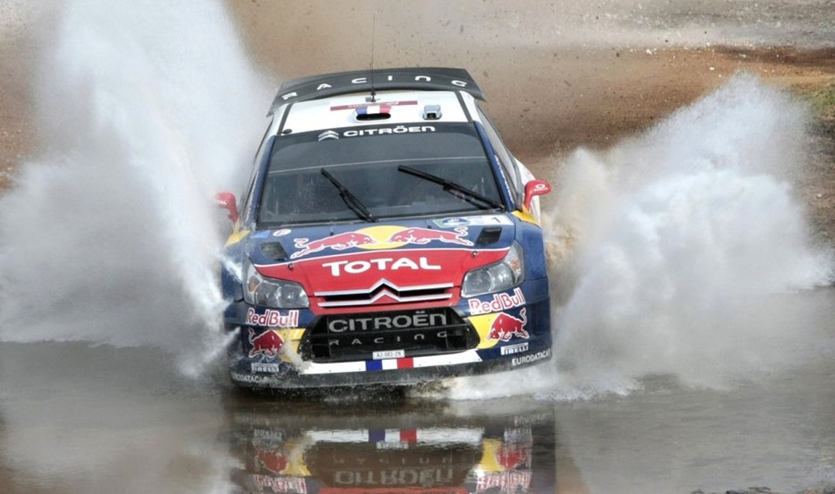 Sebastian Loeb of France and his co-driver Daniel Elena drive a Citroen C4 WRC during the first day of Rally Mexico at the FIA World Rally championship (WRC) circuit in Leon, in Mexico's state of Guanajuato March 5, 2010. REUTERS/Henry Romero (MEXICO - Tags: SPORT MOTOR RACING)