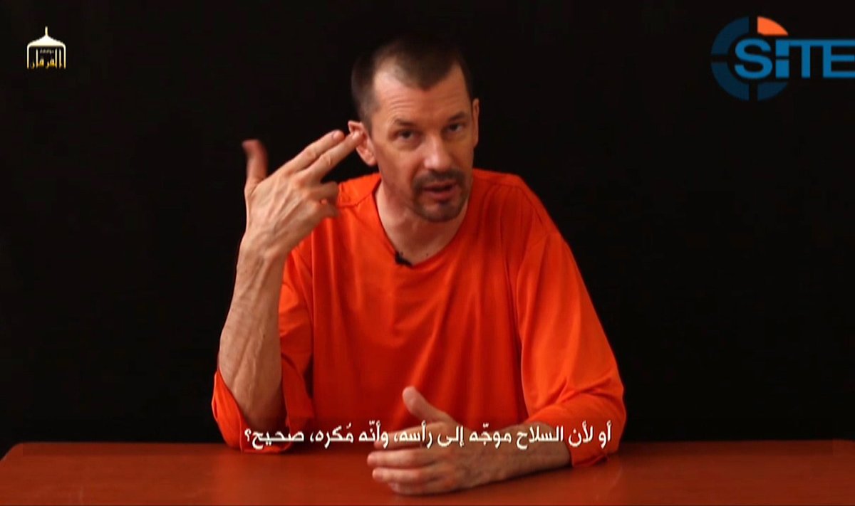 A still image taken from a purported Islamic State video shows British captive John Cantlie making a statement