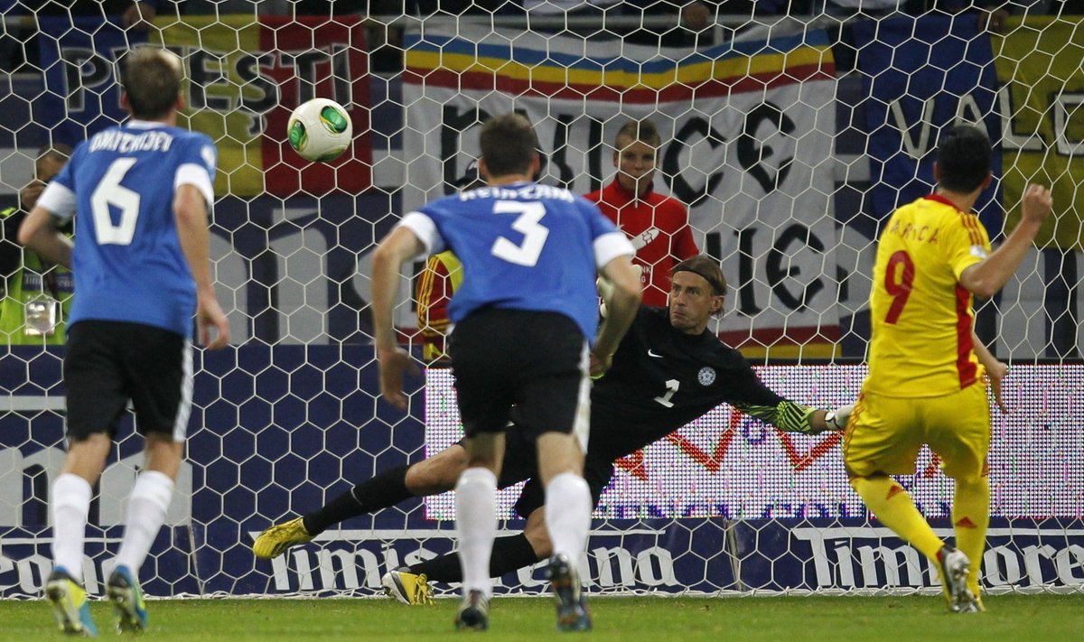 Romania's Marica scores penalty against Estonia during 2014 World Cup qualifying soccer match in Bucharest