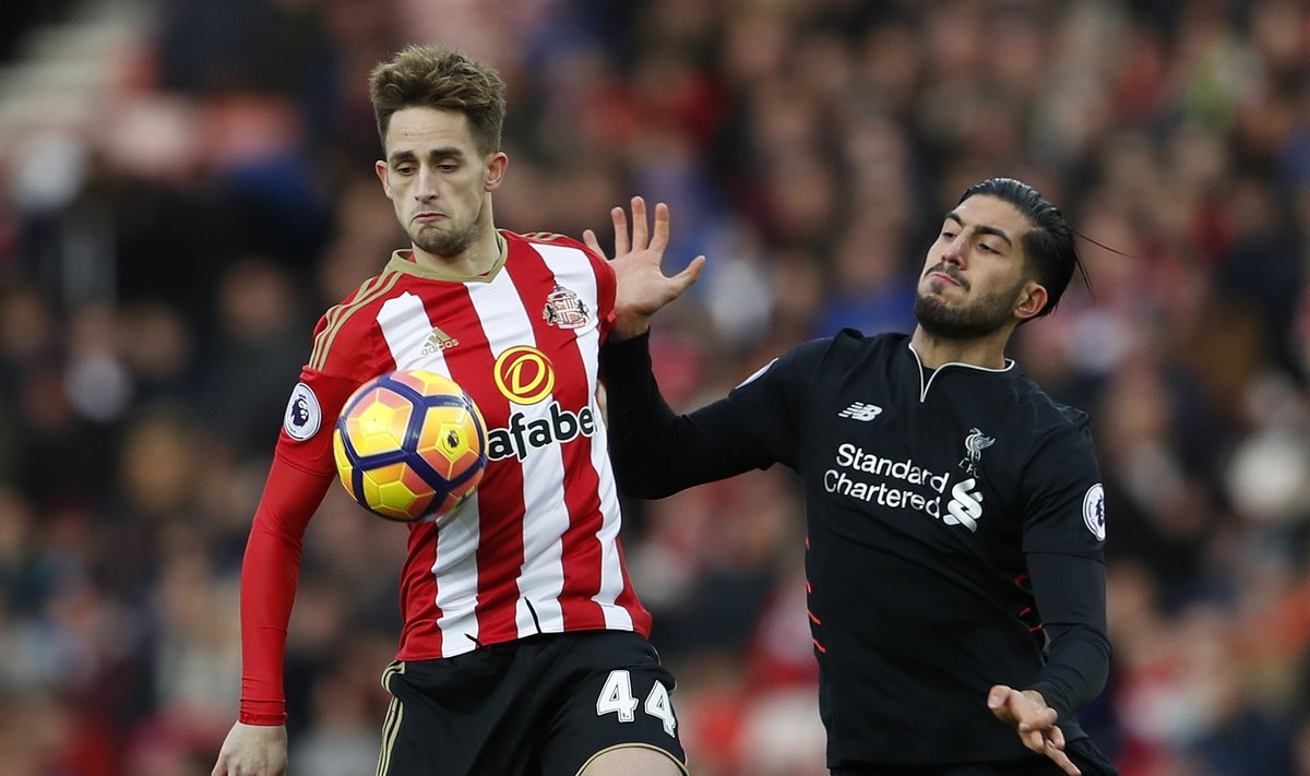 Liverpool's Emre Can in action with Sunderland's Adnan Januzaj