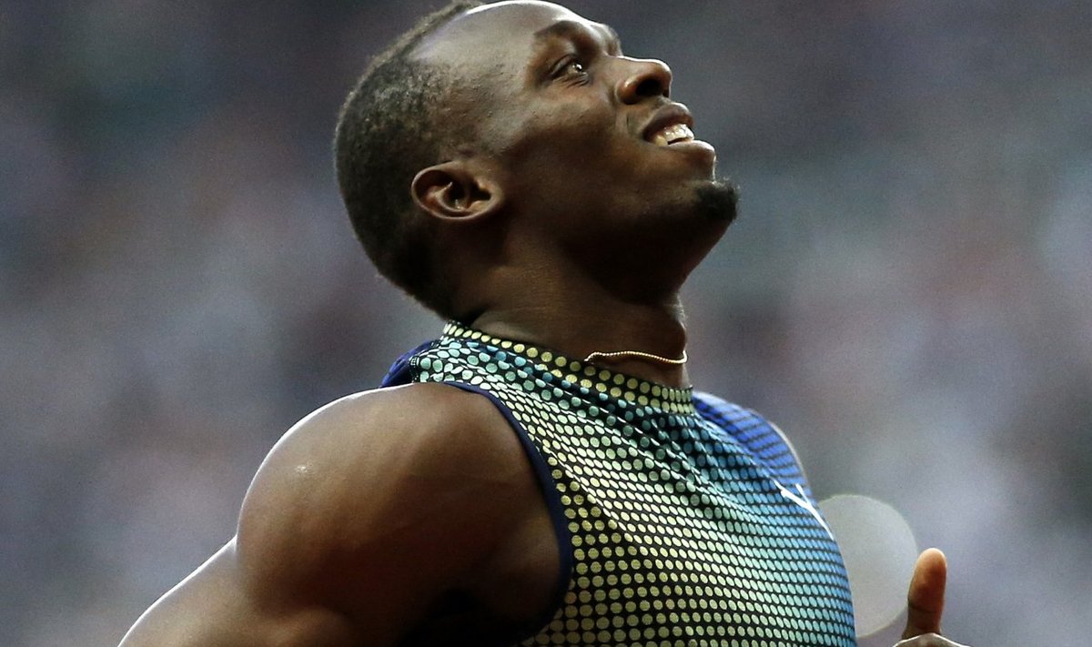 Usain Bolt of Jamaica crosses the finish line to win the men's 200 metres event during the IAAF Diamond League athletics meeting at the Stade de France Stadium in Saint-Denis, near Paris
