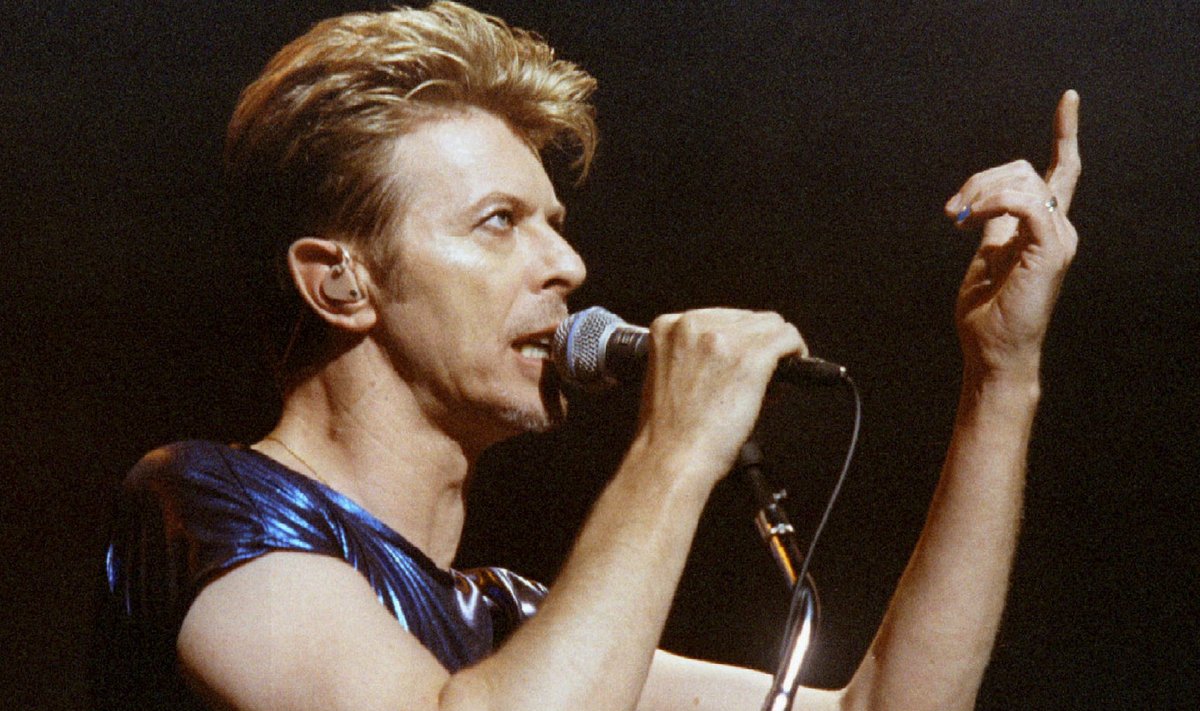 File photo of Singer David Bowie gesturing as he performs in Hartford