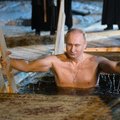 ФОТО и ВИДЕО: Путин окунулся в прорубь — ранее подобные снимки с крещенских купаний не публиковались
