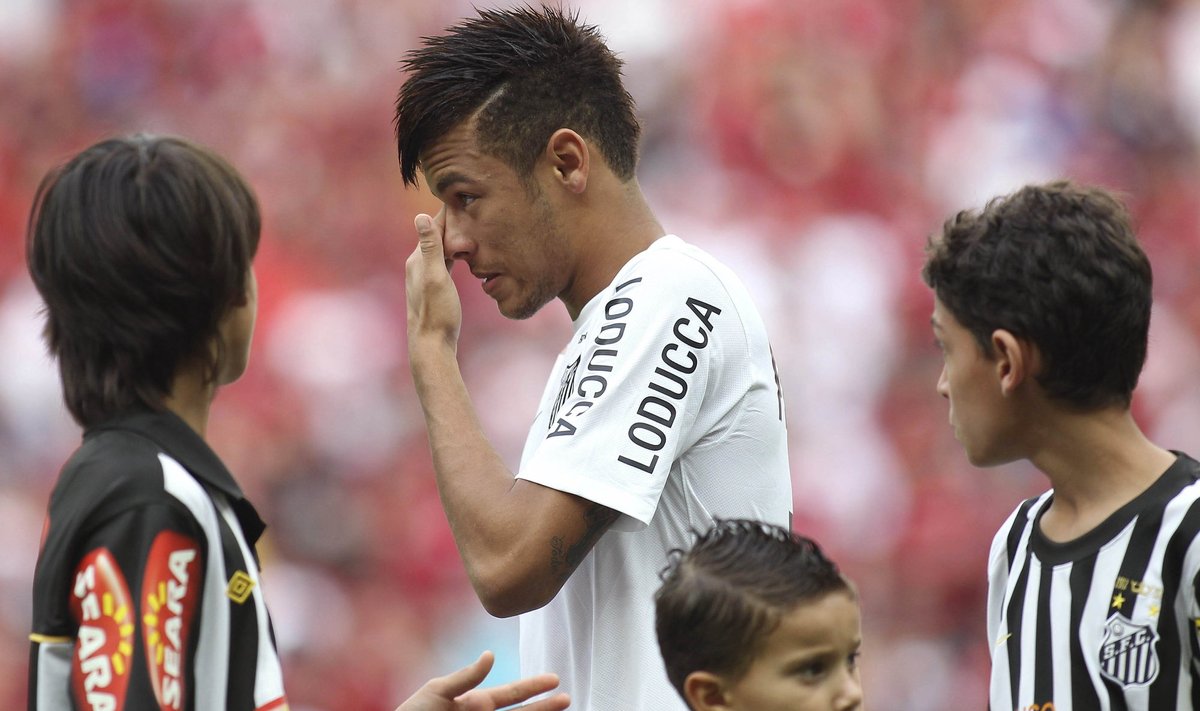 Neymar of Santos reacts before their Brazilian Serie A Championship soccer match against Flamengo at National Mane Garrincha Stadium in Brasilia