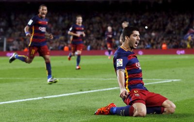 Barcelona's Luis Suarez celebrates his third goal against Eibar during their Spanish first division soccer match at Camp Nou stadium in Barcelona