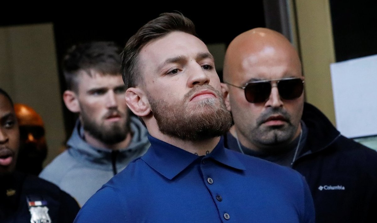 MMA fighter Conor McGregor exits after appearing in a Brooklyn court on charges of assault stemming from a melee, in the Brooklyn borough of New York