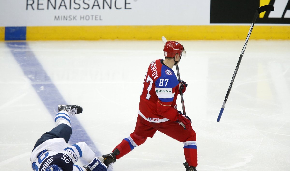 Finland's Jormakka falls after being hooked by Russia's Shipachyov during the first period of their men's ice hockey World Championship group B game at Minsk Arena in Minsk