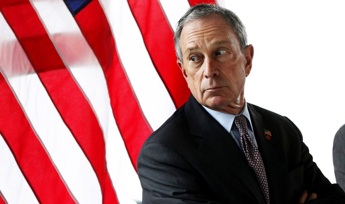 File photo of New York Mayor Bloomberg looking out a window during a news conference announcing a lease for commercial office space to the law firm WilmerHale