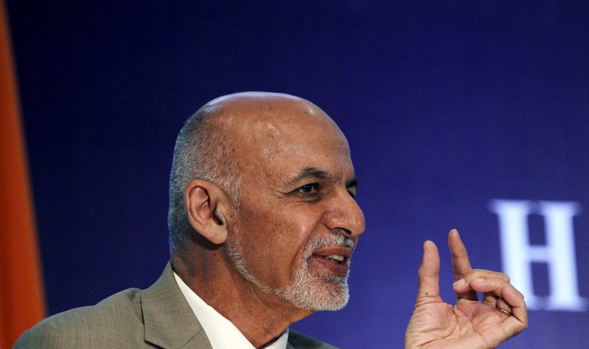Afghanistan's President Ghani gestures as he speaks during a business meeting in New Delhi