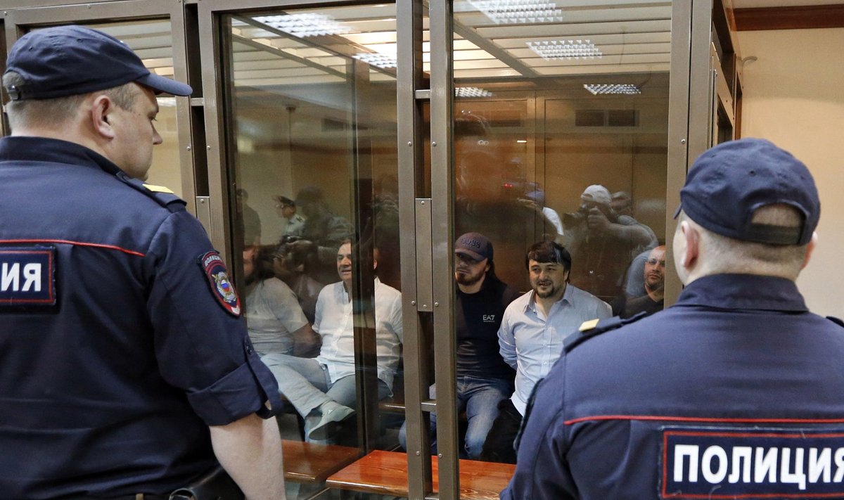 Defendants in the murder trial of Russian journalist and human rights activist Anna Politkovskaya attend a court hearing in Moscow
