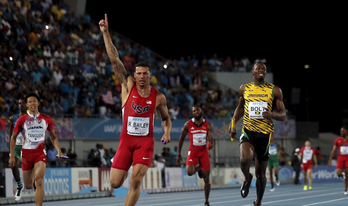 Ryan Bailey of the U.S. celebrates as he crosses the finish line ahead of Jamaica's Bolt and Japan's Taniguchi as the U.S. won the 4x100 meters race at the IAAF World Relays Championships in Nassau