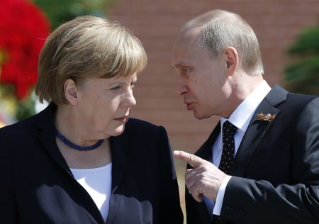 Vladimir Putin ja Angela Merkel 
