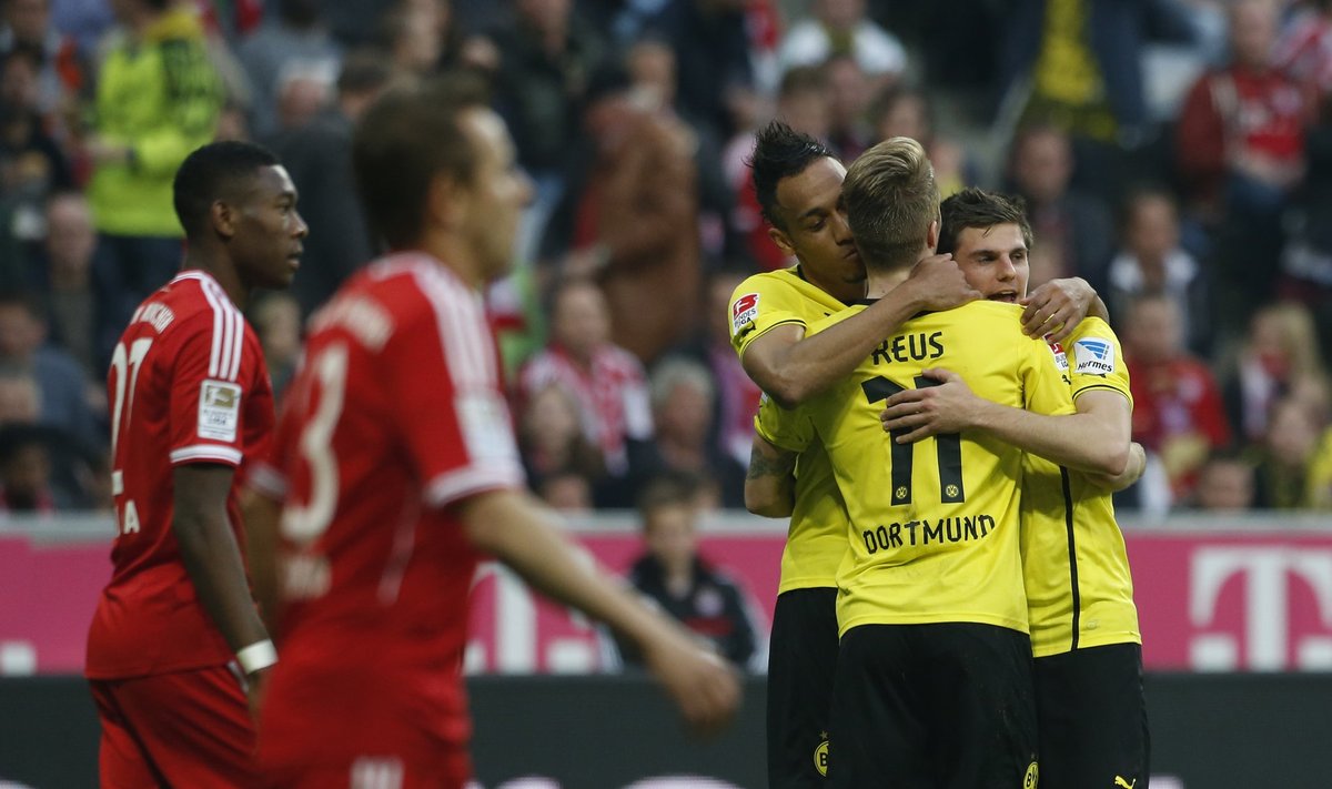 Borussia Dortmund's Aubameyang Reus and Hofmann celebrate a goal against Bayaern Munich during German Bundesliga first division soccer match in Munich
