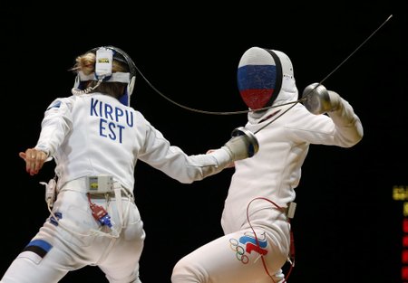 Kirpu of Estonia competes against Gudkova of Russia in the women's team epee final match at the World Fencing Championships in Kazan