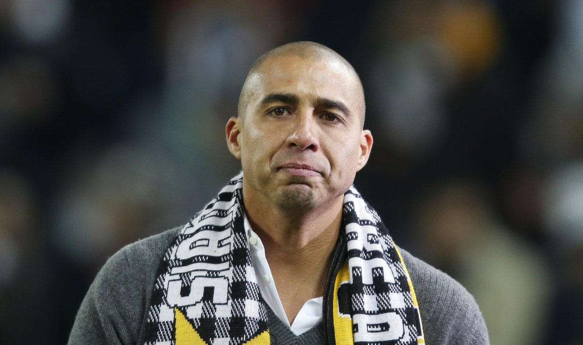 Former Juventus player David Trezeguet looks on before the start of their Italian Serie A soccer match against AS Roma at the Juventus stadium in Turin