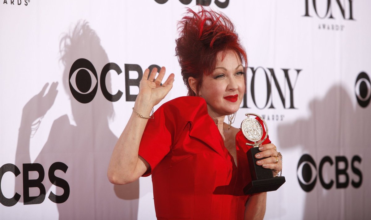 Cyndi Lauper poses with her award for Best Original Score at the American Theatre Wing's annual Tony Awards in New York