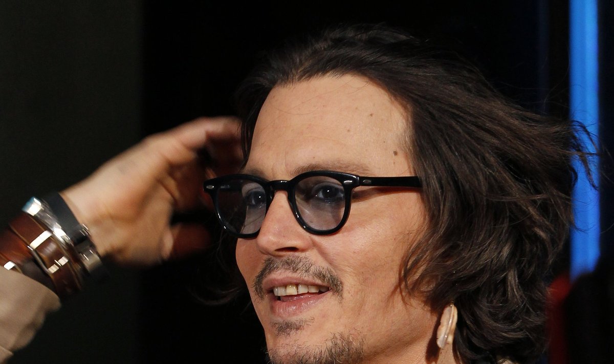 Actor Depp attends a Japan premiere event for his film "Dark Shadows" in Tokyo